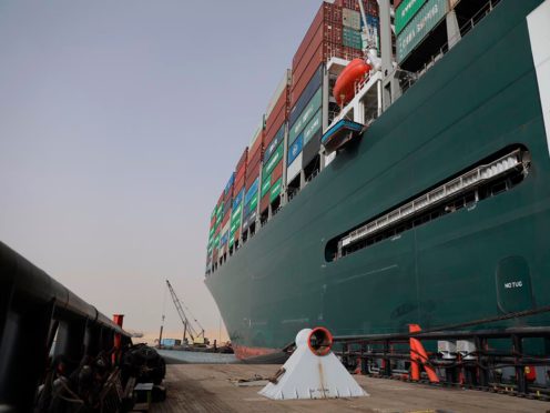 An operation is underway to try to work free the ship (Suez Canal Authority via AP)