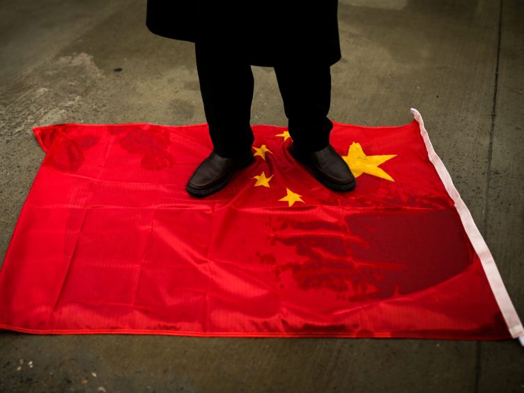 The Britons hit with Chinese sanctions have backed by the Prime Minister and Foreign Secretary (AP/Emrah Gurel)