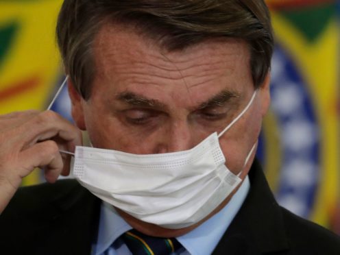 Brazil’s President Jair Bolsonaro has replaced his defence minister in a move which has caused apprehension among political analysts in the former military-controlled country (Eraldo Peres/AP)