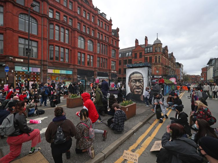 Black Lives Matter demonstrators in St Peter’s Square, Manchester (Peter Byrne/PA)