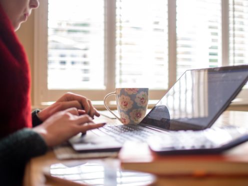 Employers have reported increased productivity from home-working (Joe Giddens/PA)