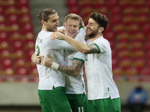 Republic of Ireland’s James McClean (centre) celebrates his goal against Qatar (Trenka Attila/PA)