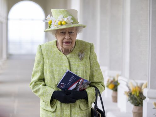 Queen Elizabeth arrives for the service to mark the centenary of the Royal Australian Air Force (Steve Reigate/Daily Express/PA)