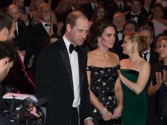The Duke and Duchess of Cambridge take their seats as they attend the EE British Academy Film Awards in 2017 (PA)