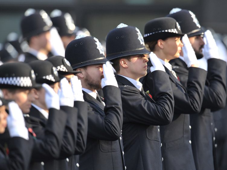 Ministers pledged to hire 20,000 new police officers by March 2023 (Nick Ansell/PA)