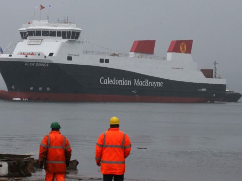 Workers view the ferry MV Glen Sannox (Andrew Milligan/PA)