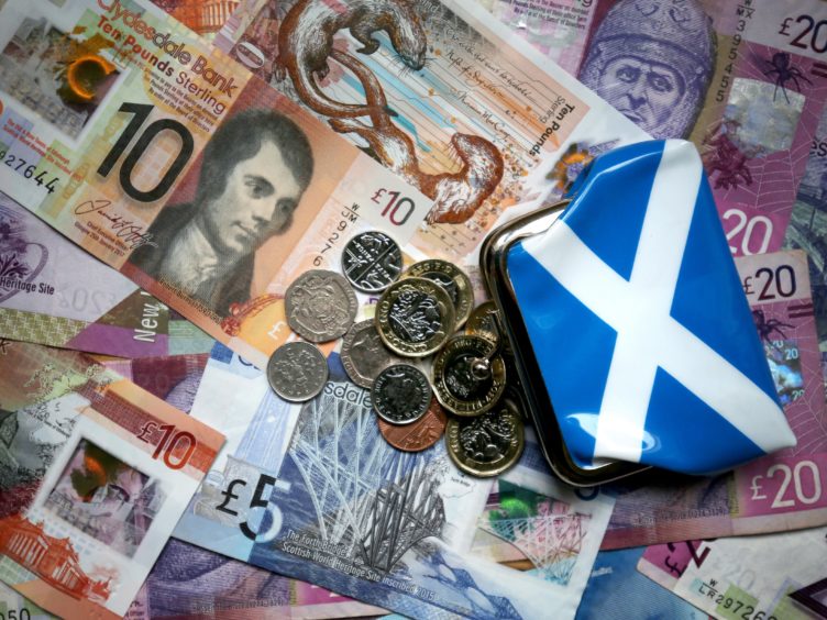 Public sector workers have seen their wages fall by 15% in real terms over the last decade, the STUC said (PA)