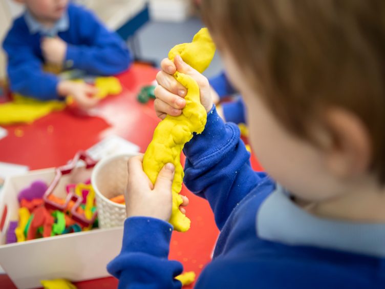 Willie Rennie said his party was making a ‘big liberal offer to families’ over childcare (PA)