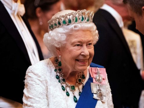 The Queen talks to guests at an evening reception for members of the Diplomatic Corps (Victoria Jones/PA)