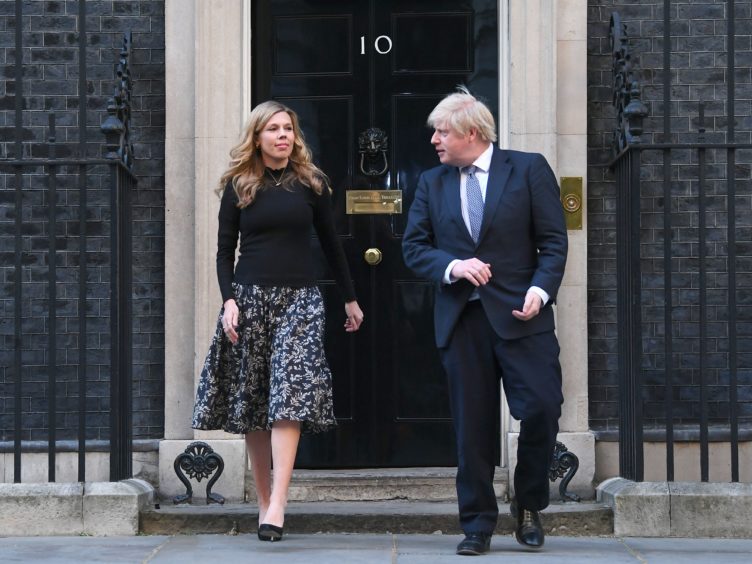 The Prime Minister and his fiancee Carrie Symonds have faced questions over the funding of their renovations to the 11 Downing Street flat (Victoria Jones/PA)