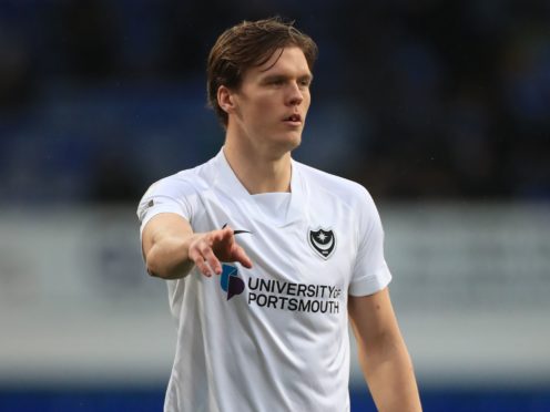 Sean Raggett was forced off injured (Mike Egerton/PA)
