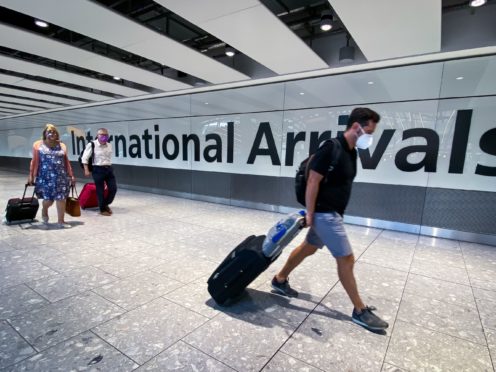 Mark Drakeford has warned against taking foreign holidays because of the risk of bringing new variants of coronavirus back to Wales (Aaron Chown/PA)