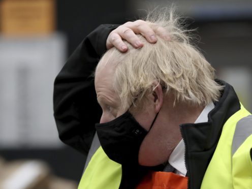 Prime Minister Boris Johnson during a visit to the B&Q store in Middlesbrough. Around two million of the UK’s lowest-paid workers will receive a pay rise from Thursday with increases in statutory minimum wages. (Scott Heppell/PA)