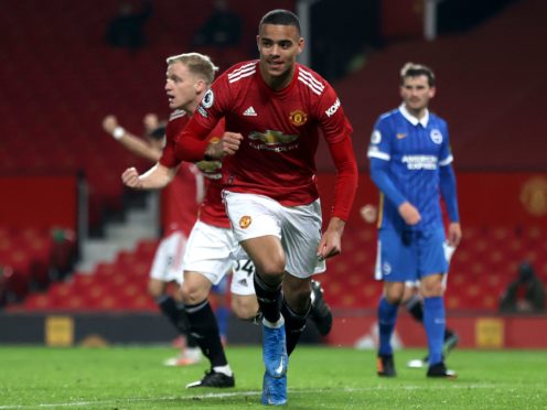 Mason Greenwood celebrates after scoring Manchester United’s winner against Brighton (Clive Brunskill/PA)