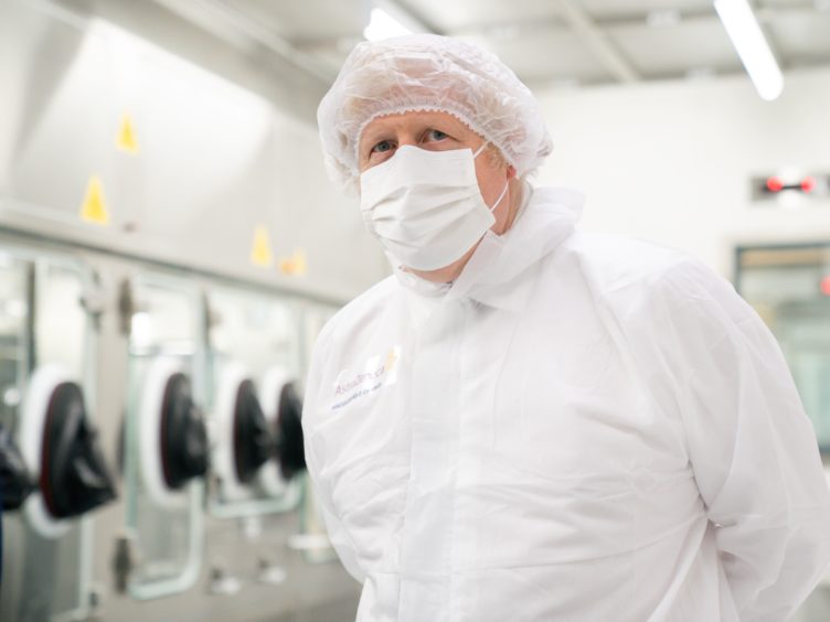 Prime Minister Boris Johnson during a visit to the AstraZeneca site in Macclesfield, Cheshire (David Thompson/Daily Telegraph/PA)