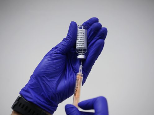 A dose of the Oxford/AstraZeneca coronavirus vaccine is prepared (PA)