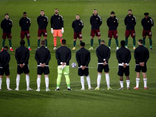 Players paid their respects before Fulham’s game with Wolves (Andrew Couldridge/PA)