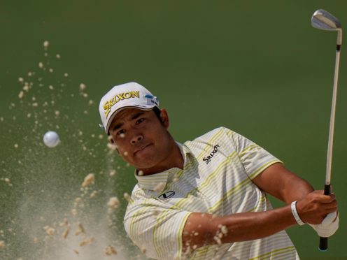 Hideki Matsuyama hits out of a bunker on the second hole during the final round of the 85th Masters (Matt Slocum/AP)