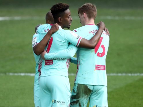 Jamal Lowe celebrates scoring Swansea’s opener (Tim Goode/PA)