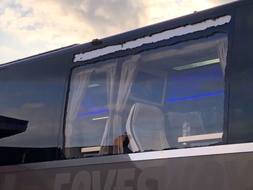 A window of the Real Madrid team coach was smashed outside Anfield (Carl Markham/PA)