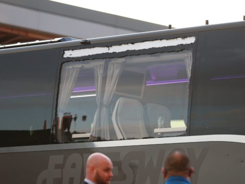 A window was smashed on the Real madrid team bus (Peter Byrne/PA)