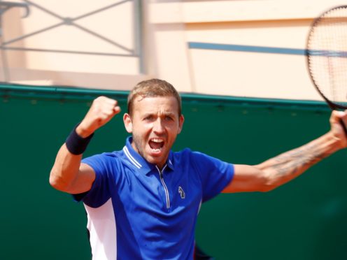 Dan Evans celebrates another fine win in Monte-Carlo (Jean-Francois Badias/AP)
