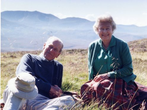 A photograph of the Queen and the Duke of Edinburgh in the Scottish Highlands was released on the eve of the duke’s funeral (The Countess of Wessex/PA)