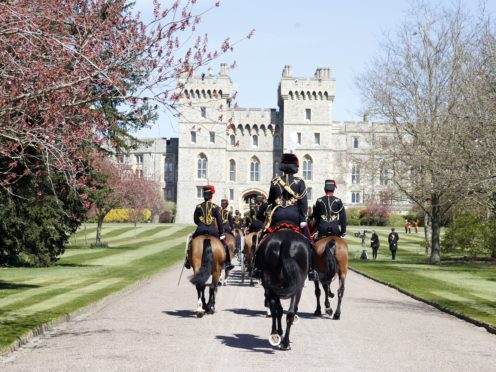 King’s Troop Royal Horse Artillery make their way up The Long Walk towards Windsor Castle (Phil Noble/PA)