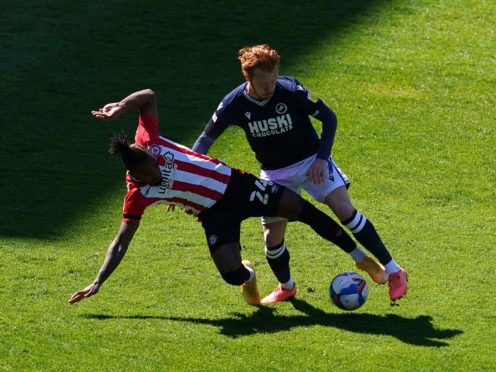 Ryan Woods, right, and Brentford’s Tariqe Fosu (John Walton/PA)