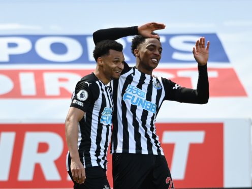 Joe Willock (right) celebrates scoring the winner (Stu Forster/PA)