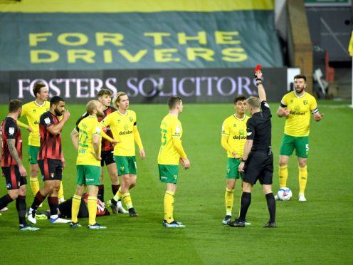 Norwich’s Dimitris Giannoulis was sent off in defeat to Bournemouth (Joe Giddens/PA)