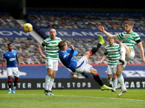 Rangers’ Steven Davis (centre) scores against Celtic (Jane Barlow/PA)