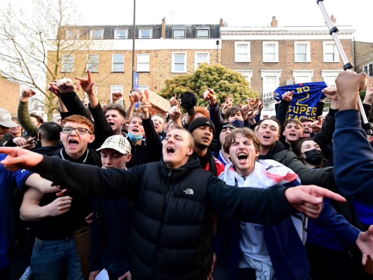 Fans react after potential news that Chelsea are preparing to withdraw from the European Super League (Ian West/PA)