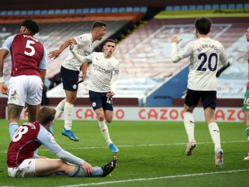 Manchester City’s Phil Foden celebrates his goal in the win at Aston Villa (Carl Recine/PA)