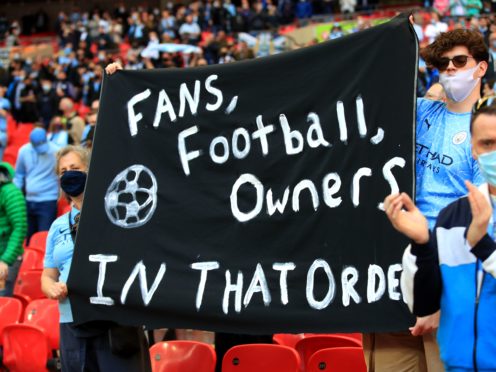Manchester City fans hold up a banner at the Carabao Cup final at Wembley on April 25 (Adam Davy/PA)