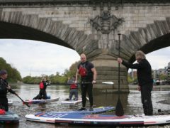James Haskell, Charley Boorman, Dean Stockton and the training instructors prepare to start training on the River Thames (Luciana Guerra/PA)