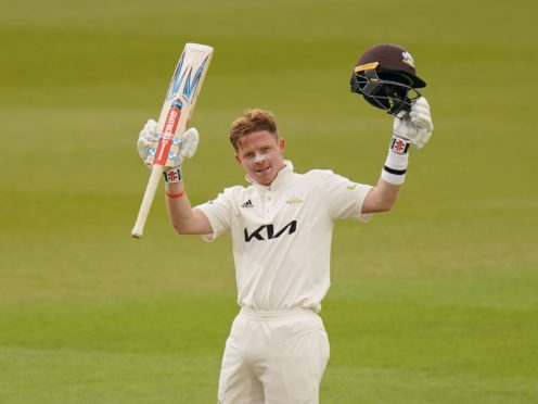 Surrey’s England batsman Ollie Pope celebrates his century against Hampshire at the Oval (Adam Davy/PA)