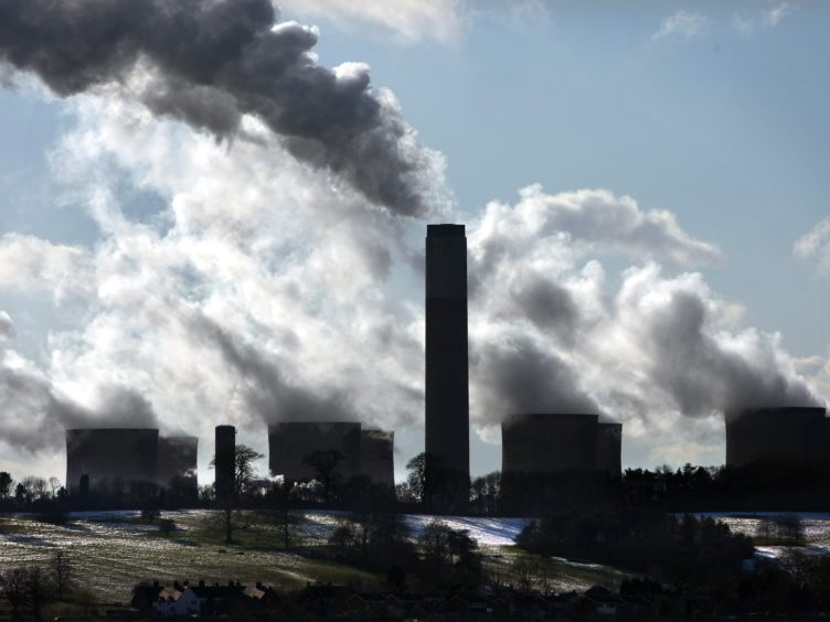 Joe Biden is hosting a virtual summit calling for action to cut emissions (David Jones/PA)