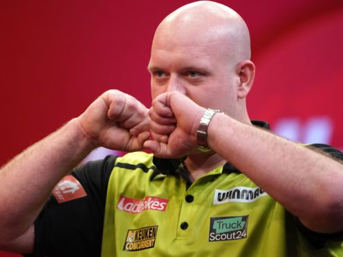 Michael Van Gerwen, pictured, got the better of Jonny Clayton in Milton Keynes (Zac Goodwin/PA)