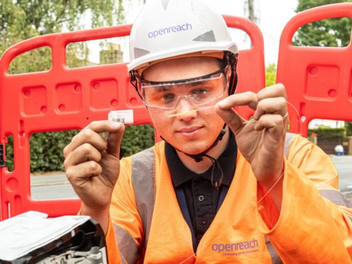 BT is set to see profits fall, but shareholders are hopeful a dividend could return (Openreach / PA)