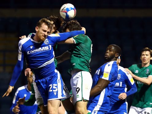 Robbie Cundy (left) missed Gillingham’s clash against Burton last week (Gareth Fuller/PA)