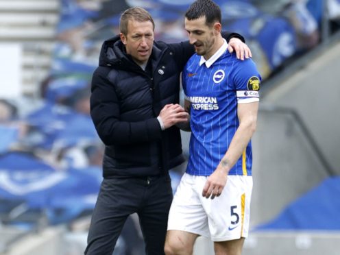 Brighton boss Graham Potter, left, was delighted with Lewis Dunk’s display against Leeds (John Sibley/PA)
