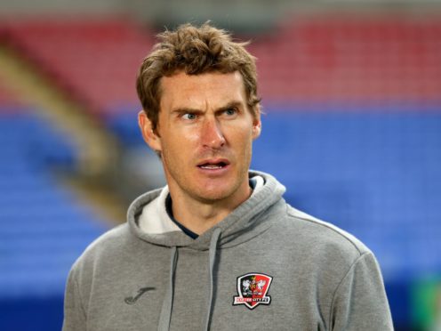 Exeter City manager Matt Taylor could yet see his side sneak into the play-off places (Tim Markland/PA)