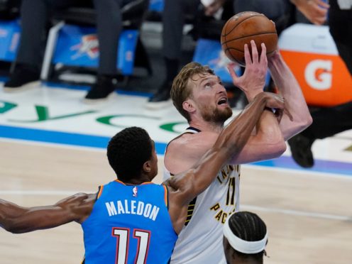 Indiana Pacers forward Domantas Sabonis is fouled by Oklahoma City Thunder guard Theo Maledon in their one-sided NBA match on Saturday night (Sue Ogrocki/AP)