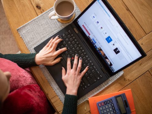 A number of businesses, which together employ more than a million workers, are expected to take up hybrid working patterns, according to research (Joe Giddens/PA)