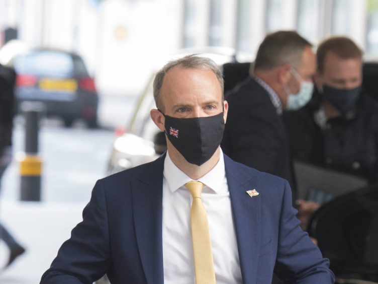 Foreign Secretary Dominic Raab said foreign aid had to be cut due to the coronavirus pandemic (Ian West/PA)
