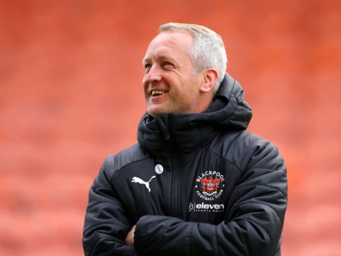 Neil Critchley’s Blackpool have clinched a play-off spot (Tim Markland/PA)