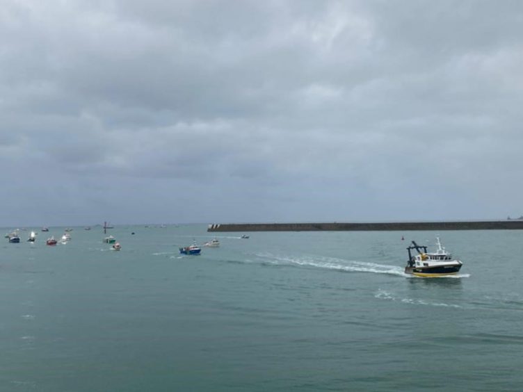 French fishing vessels gathering outside the harbour at St Helier (Josh Dearing/PA)