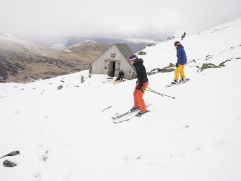 Skiers and snowboarders take to the slopes at the Lake District Ski Club on Raise, next to Helvellyn, after an unseasonal May snowfall (Owen Humphreys/PA)