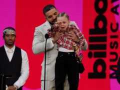 Drake was joined by three-year-old son Adonis as he was named artist of the decade at the Billboard Music Awards (Chris Pizzello/AP)